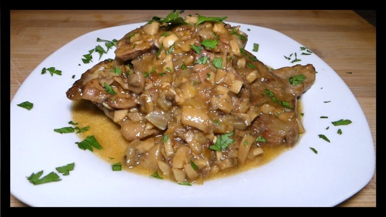 Filetes de ternera en salsa con champiñones