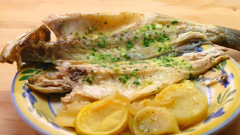 Lubina al horno con patatas y cebolla