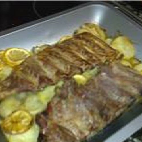 Costillar de cerdo al horno con patatas
