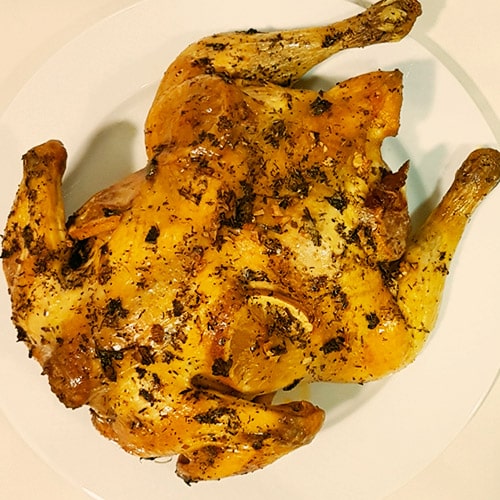 Pollo al horno con verduras y vino blanco